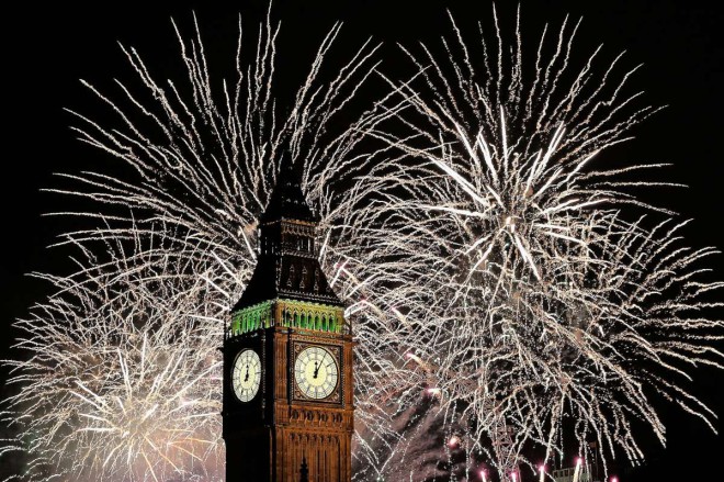 Big Ben surrounded fireworks midnight 1200